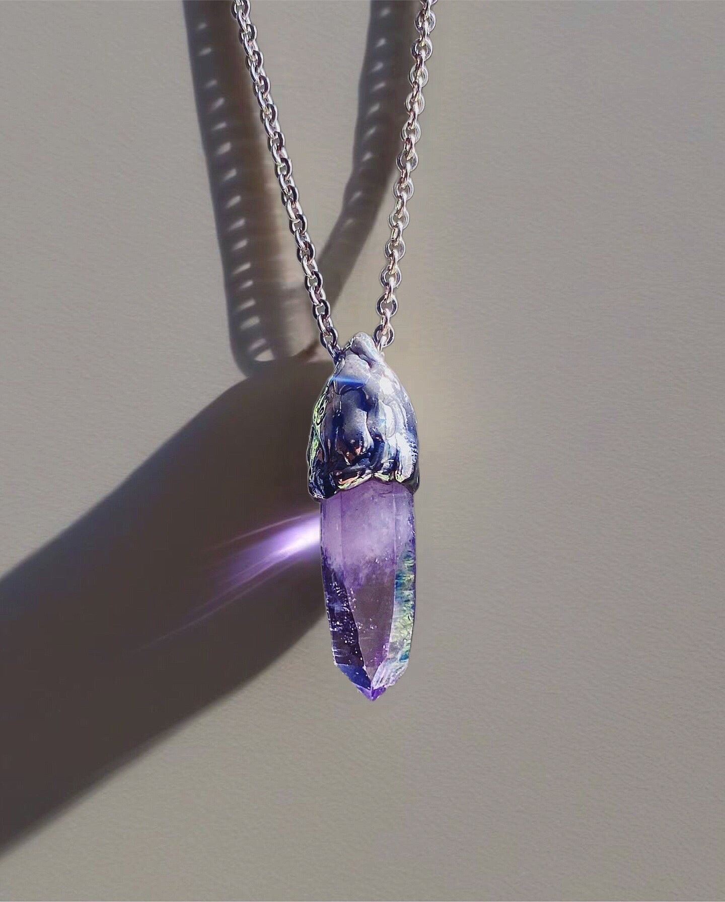 Amethyst crystal amulet