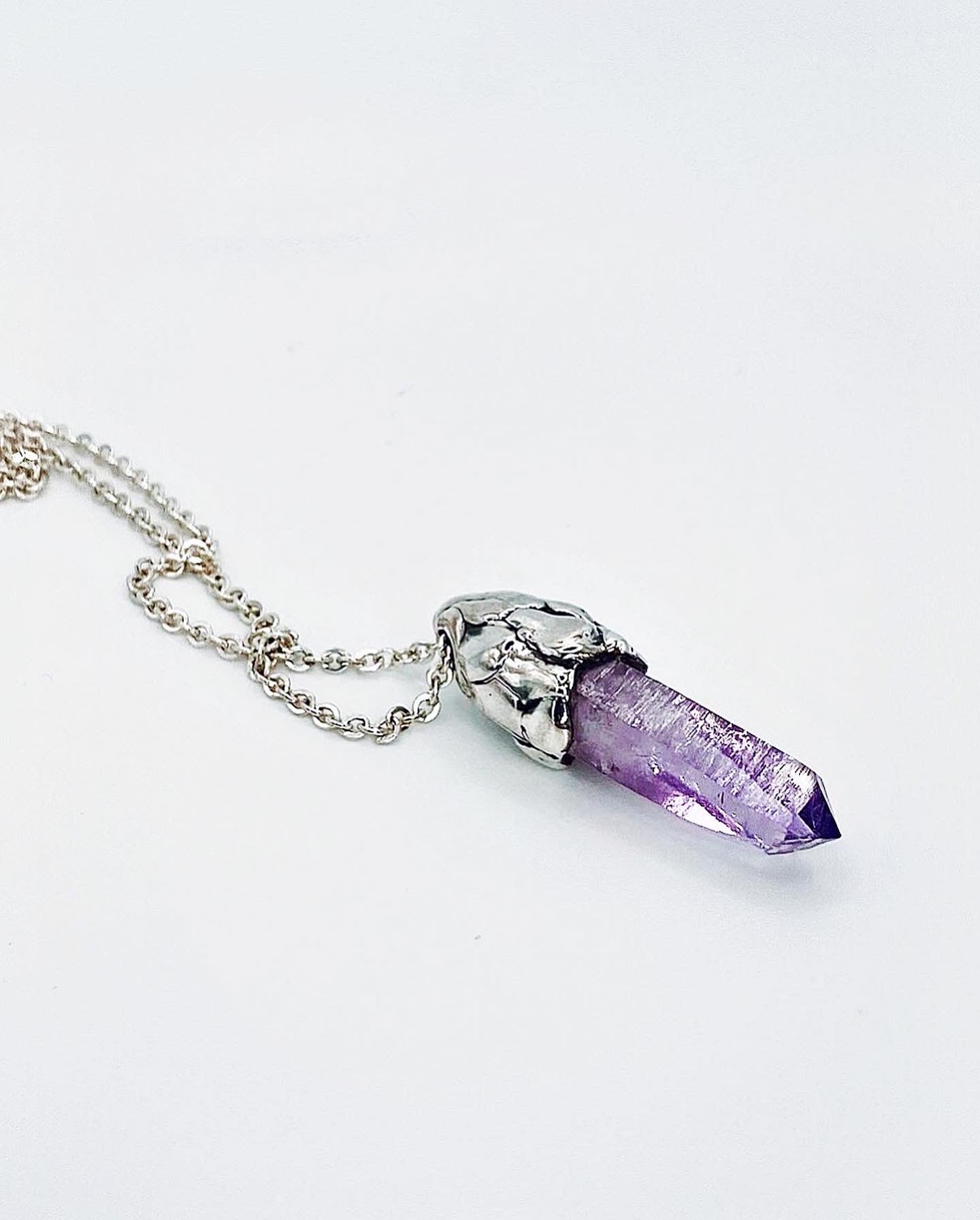 Amethyst crystal amulet